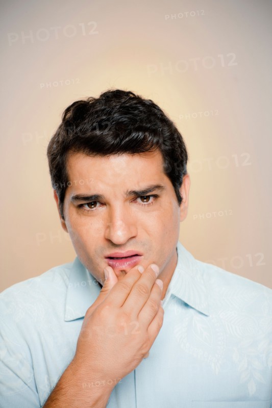 Portrait of man expressing uncertainty. Photo : Rob Lewine