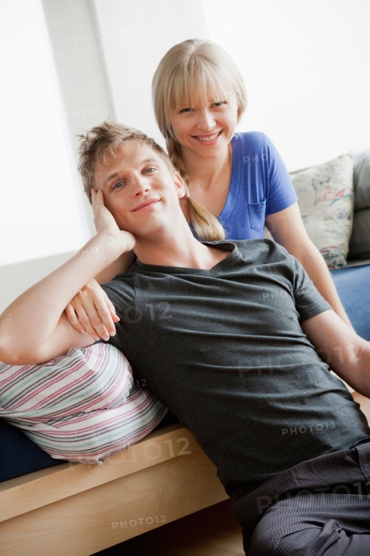 Portrait of couple in bedroom. Photo : Rob Lewine