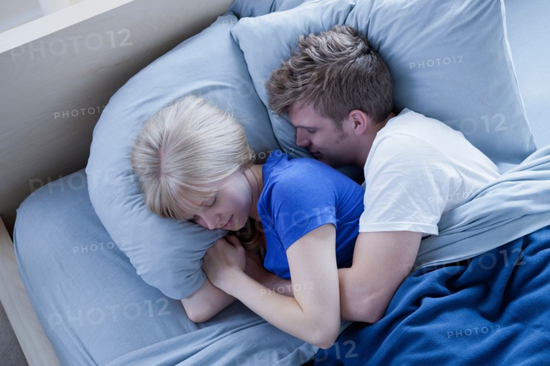 Elevated view of sleeping couple. Photo : Rob Lewine