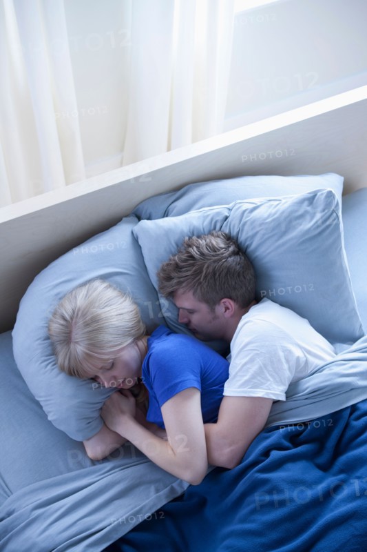 Elevated view of sleeping couple. Photo : Rob Lewine
