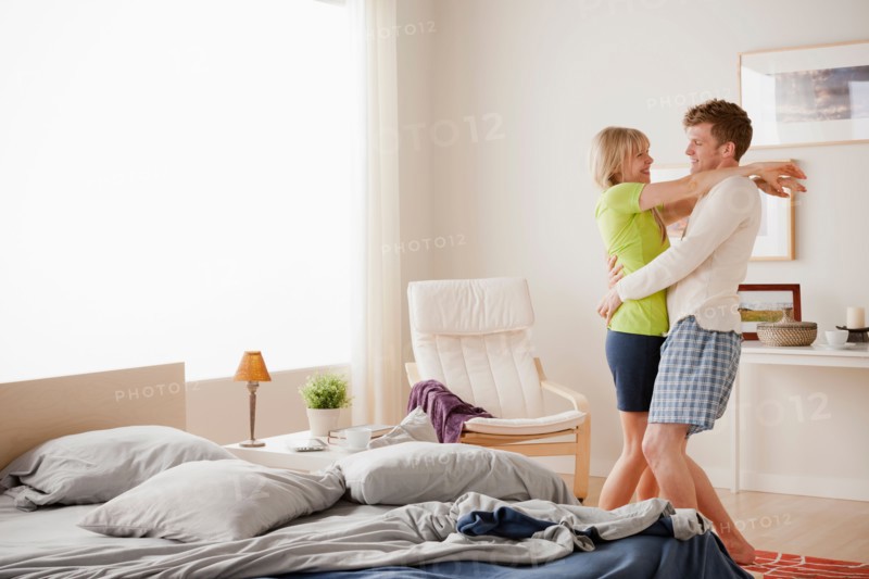 Couple dancing in bedroom. Photo : Rob Lewine