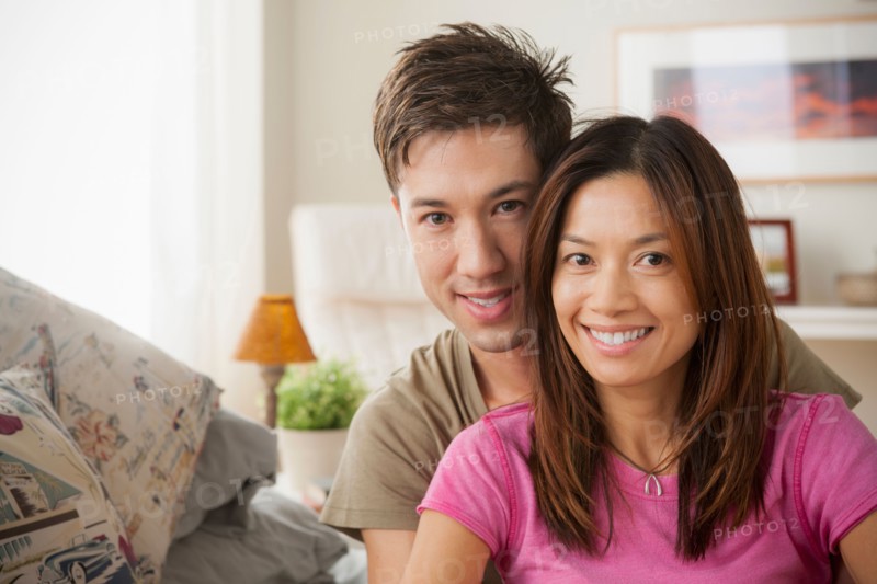 Portrait of smiling couple. Photo : Rob Lewine