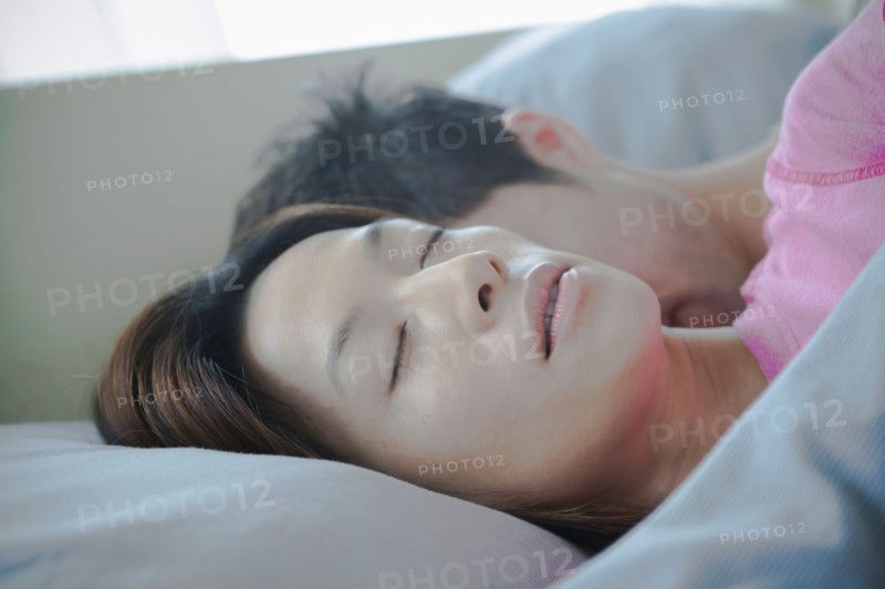 Close up of couple sleeping. Photo : Rob Lewine