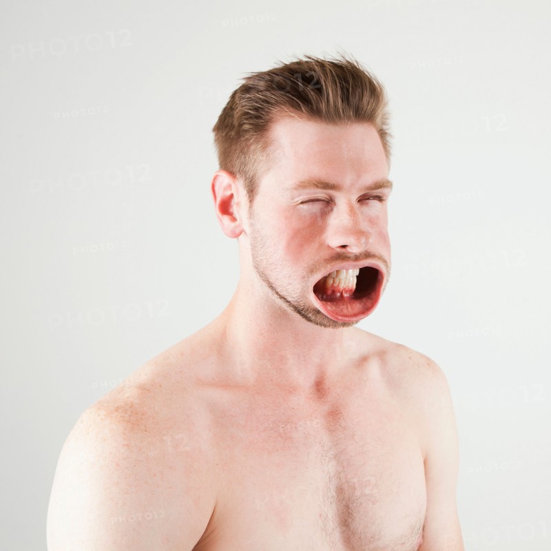 Studio shot of man with windblown mouth. Photo: Jessica Peterson