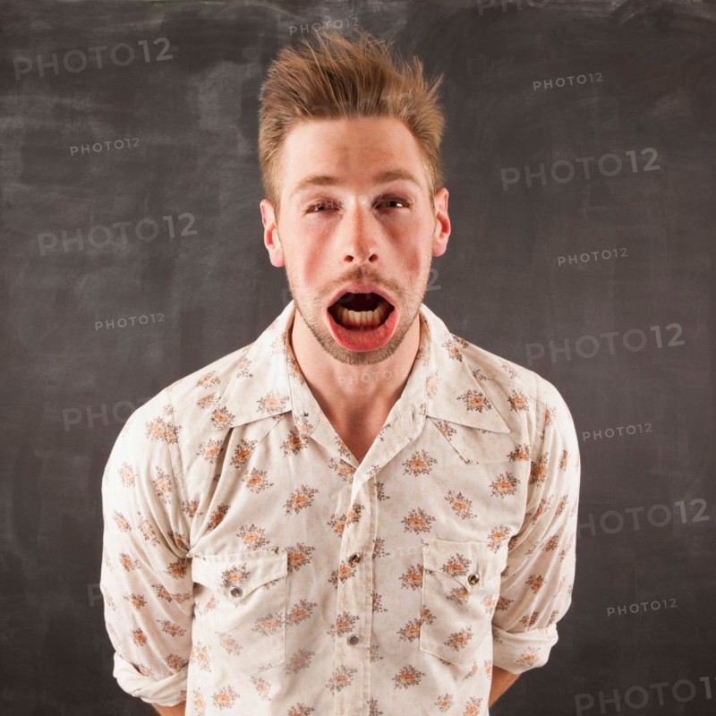 Studio shot of man with windblown mouth. Photo: Jessica Peterson