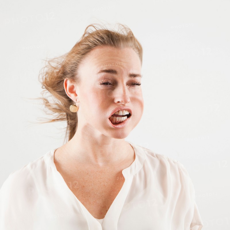 Studio shot of woman with windblown mouth. Photo: Jessica Peterson