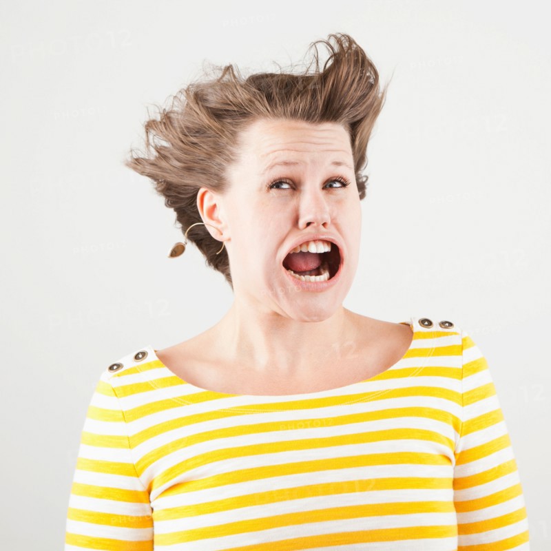 Studio shot of woman with windblown mouth. Photo: Jessica Peterson