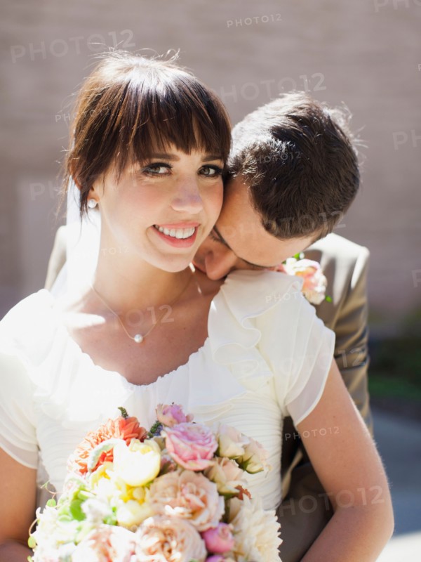 Portrait of young bride and groom. Photo : Jessica Peterson