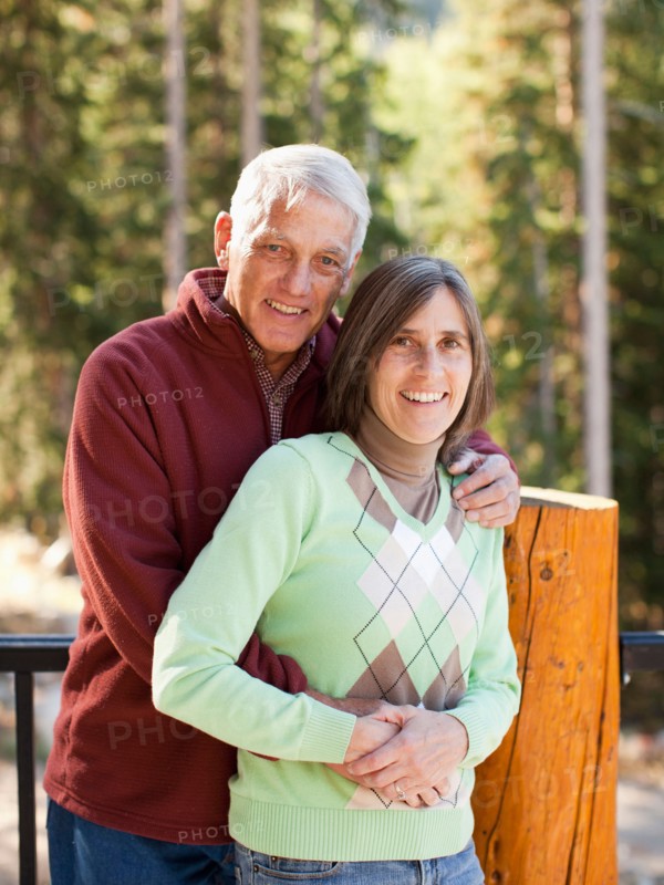 Portrait of smiling couple outdoors. Photo: Jessica Peterson