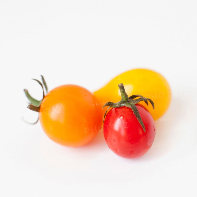 Studio Shot of three Cherry Tomatoes. Photo: Jessica Peterson