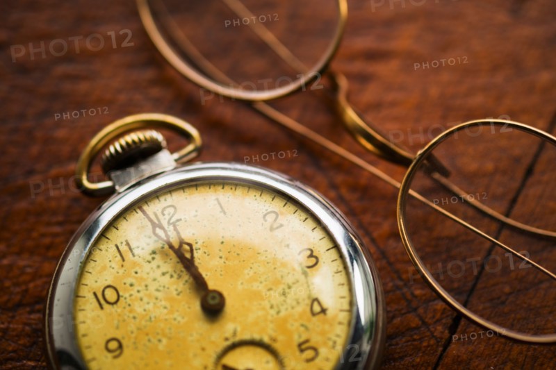 Antique clock and glasses.