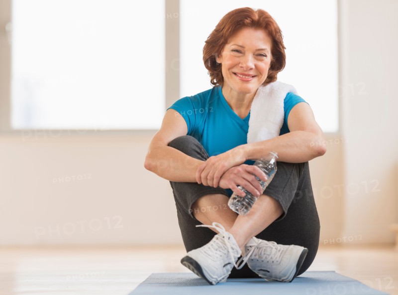Portrait of senior woman in gym.