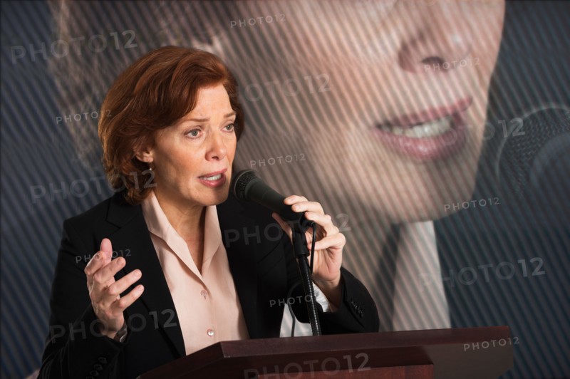Female politician performing speech.