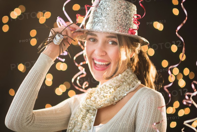 Woman celebrating New Year's Eve.