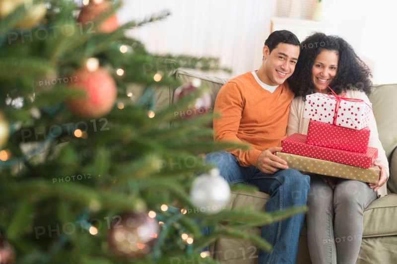 Couple with Christmas gifts.
