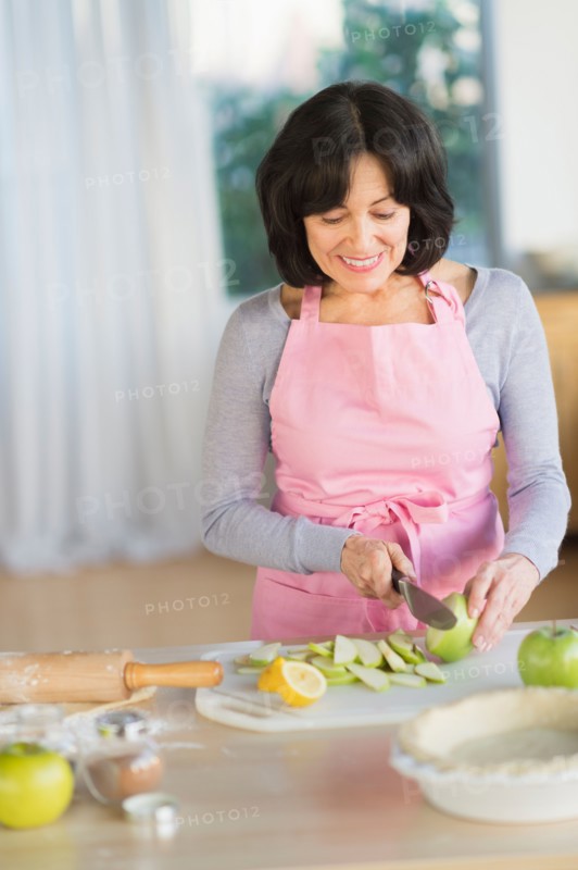 Senior woman baking.