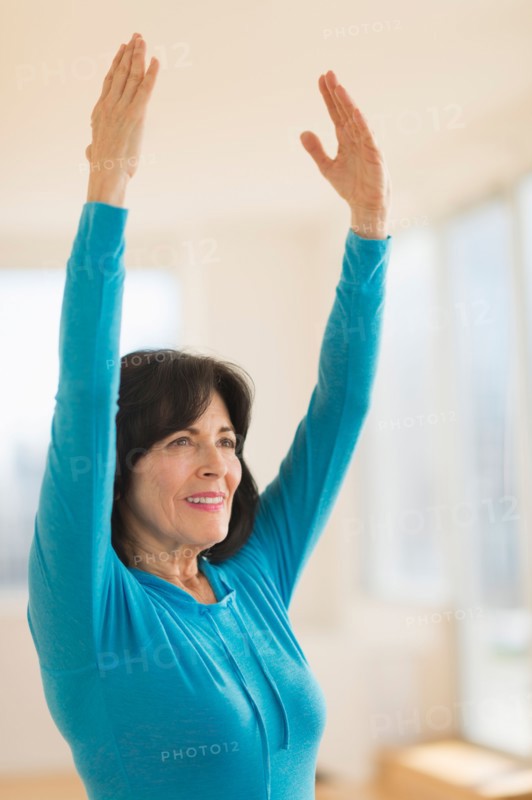 Portrait of senior woman exercising.