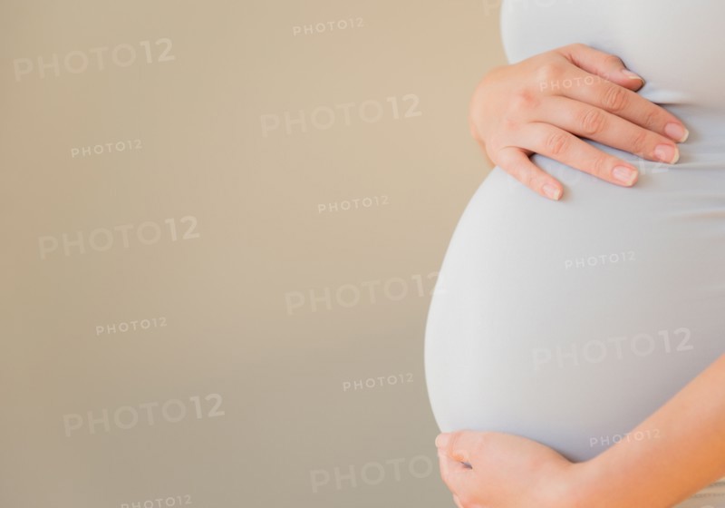 Close-up of pregnant woman's belly