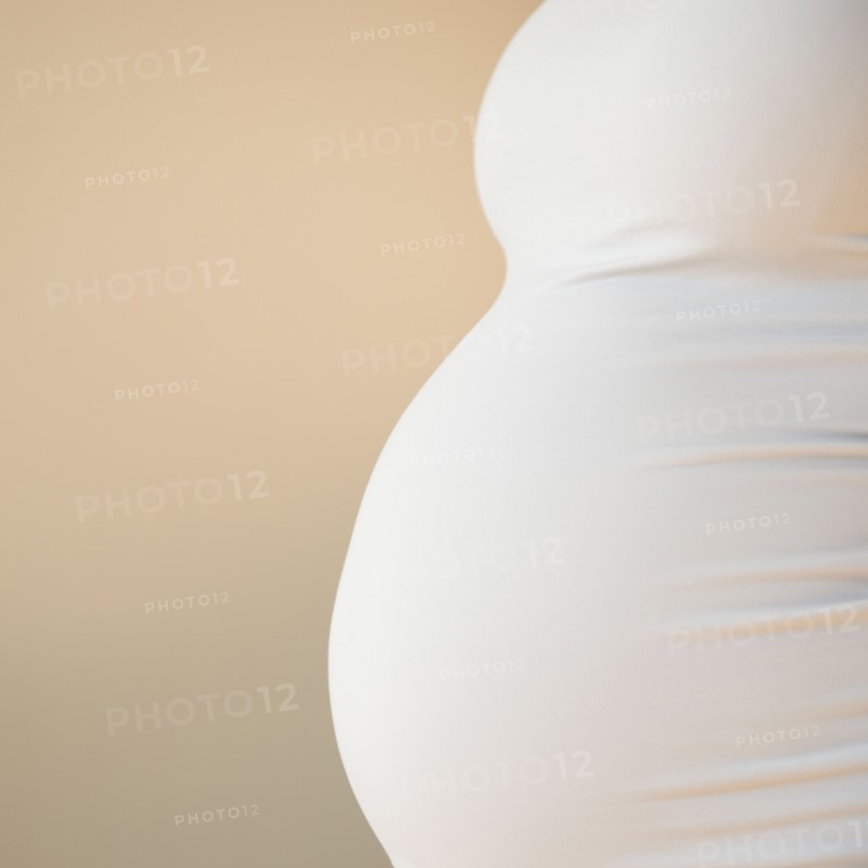Close-up of pregnant woman's belly