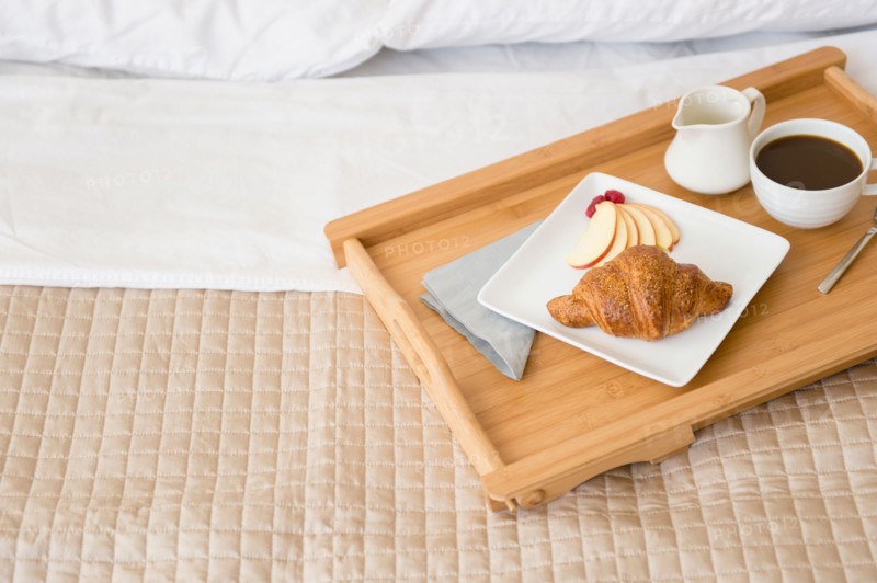 Breakfast plate on bed