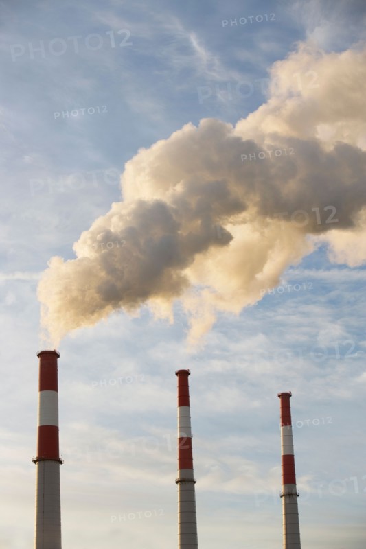 Smoke emitting from smoke stacks