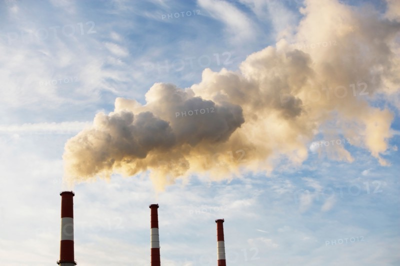 Smoke emitting from smoke stacks