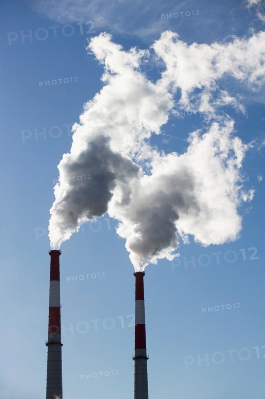 Smoke emitting from smoke stacks