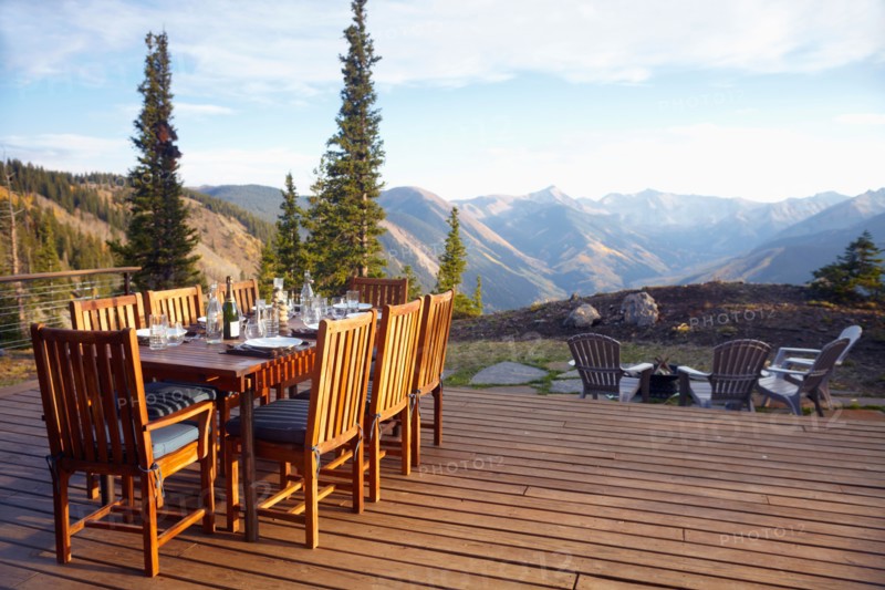 Outdoor table and chairs on wooden terrace