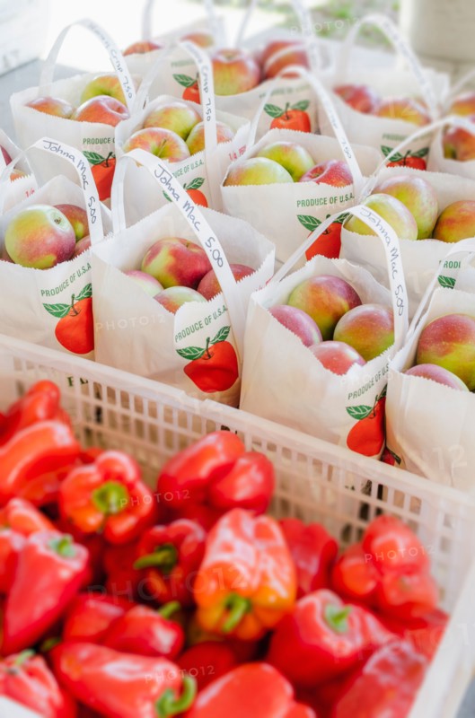 Apples and red peppers ready to be bought
