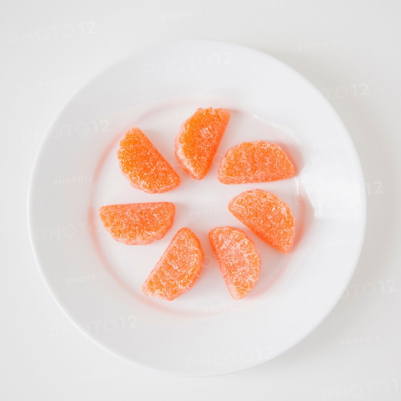 Studio Shot of candies imitating orange