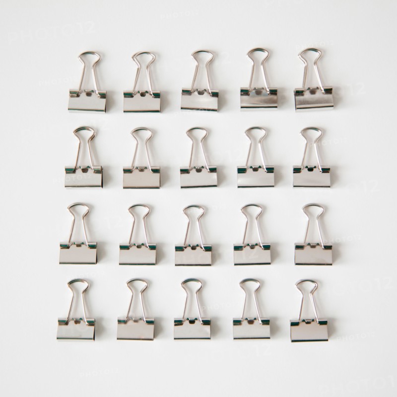 Studio Shot of rows of Paper Clips