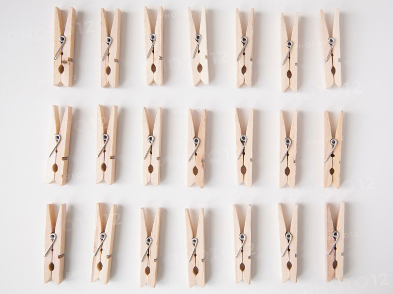 Studio Shot of rows of clothespins