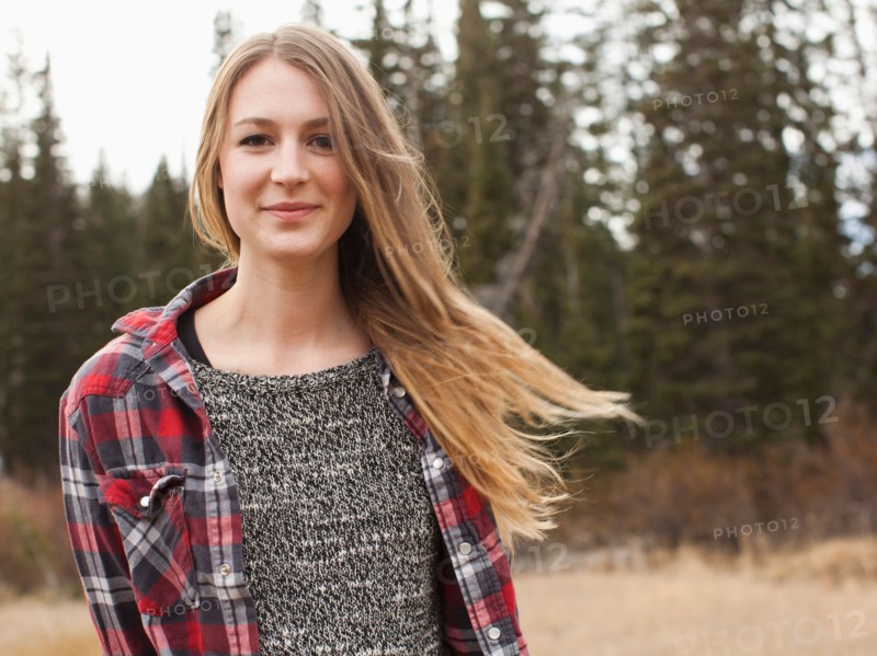 Portrait of young woman in non-urban scene
