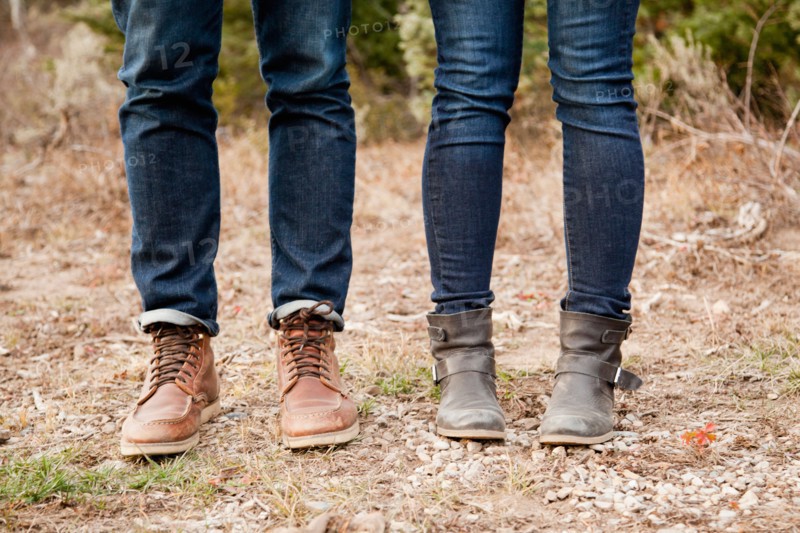 Low section of young people in denim jeans
