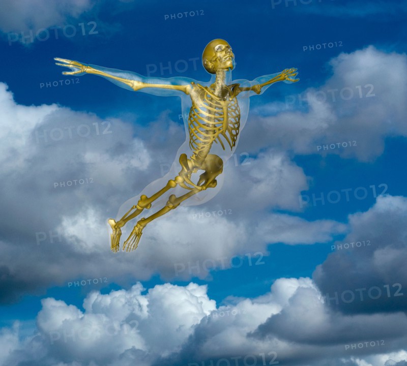 Human skeleton flying amidst clouds