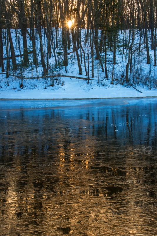 Icy water surface. Walden Pond, Concord, Massachusetts.