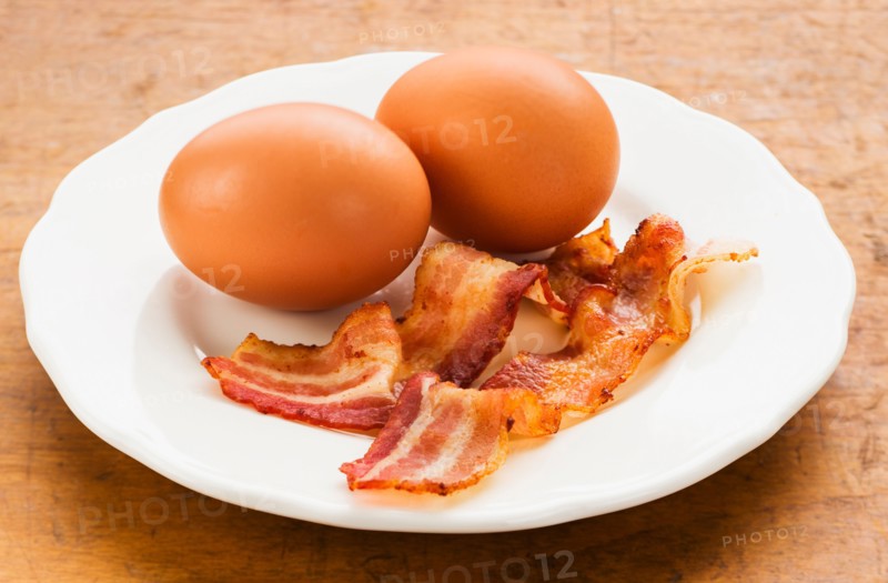 Fried bacon and eggs.