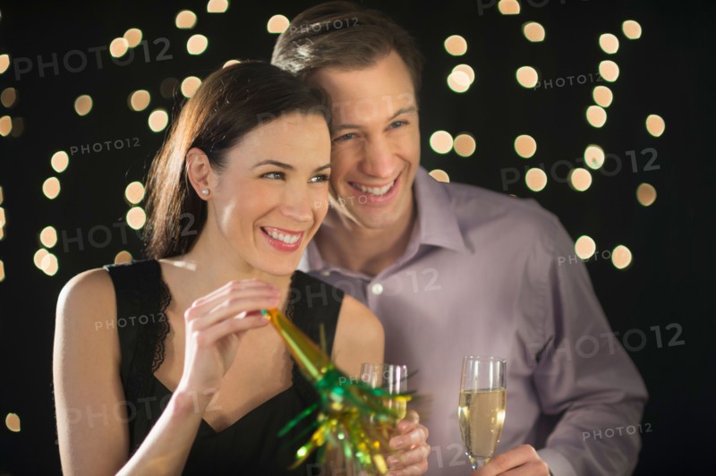 Couple celebrating new year's eve.