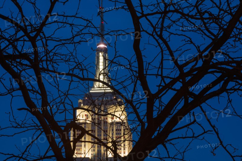 Empire State building illuminated at dusk. New York, New York.