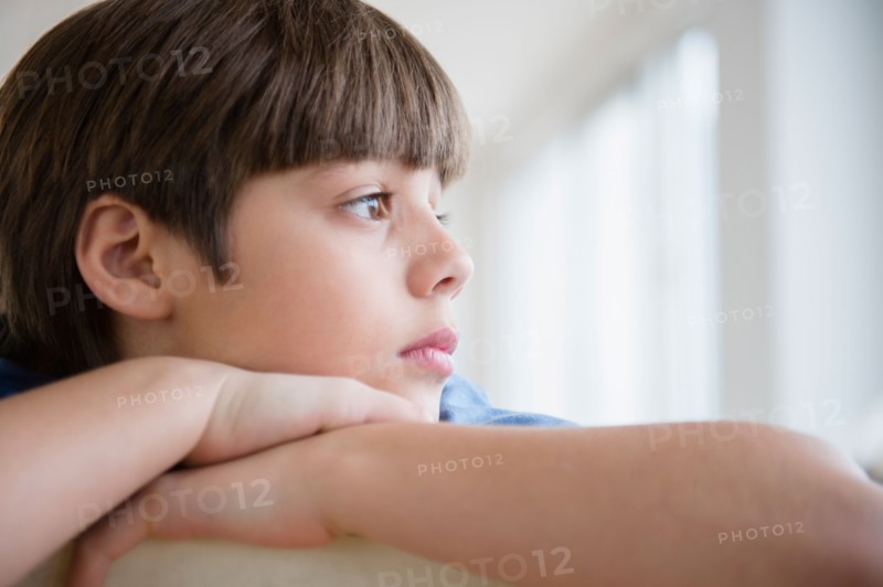 Portrait of pensive boy (8-9)