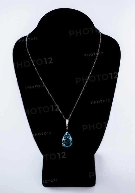 Studio shot of beautiful necklace with blue stone