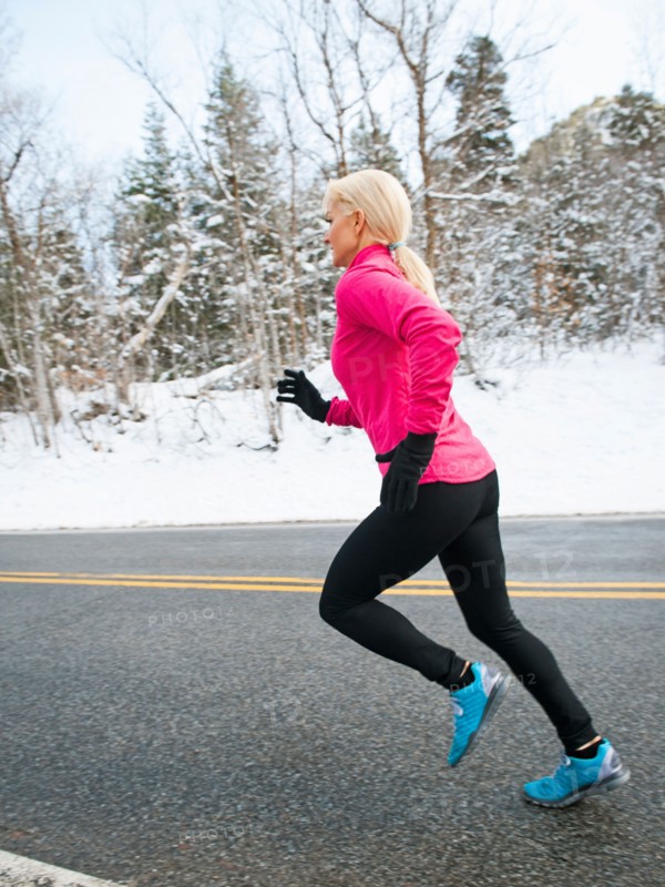 Woman jogging in winter