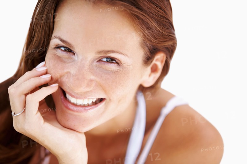 Studio portrait of woman smiling