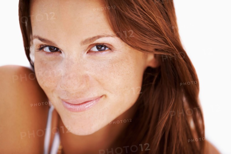 Studio portrait of woman smiling