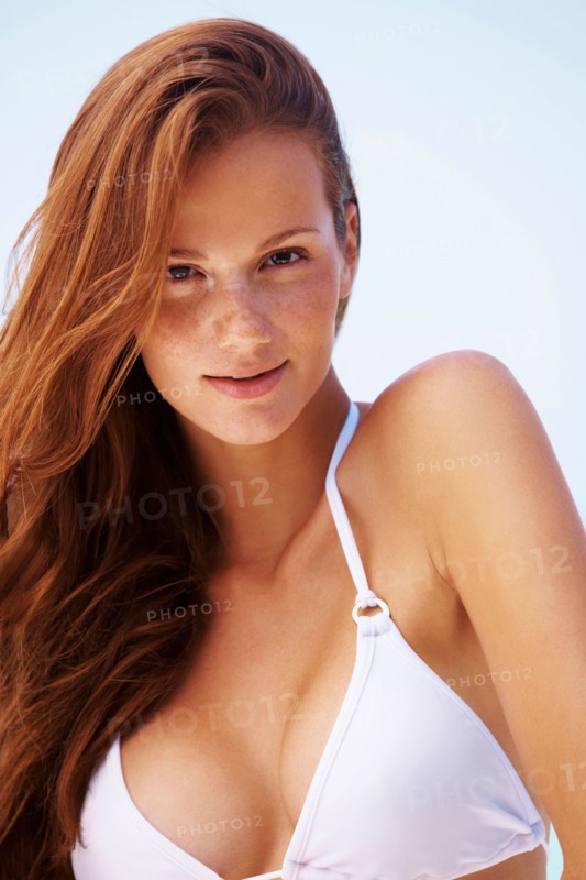 Portrait of young woman in bikini