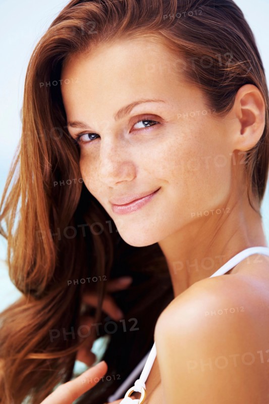 Portrait of young woman in bikini
