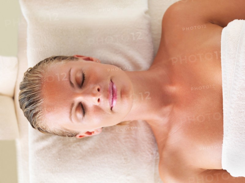 Woman relaxing in spa