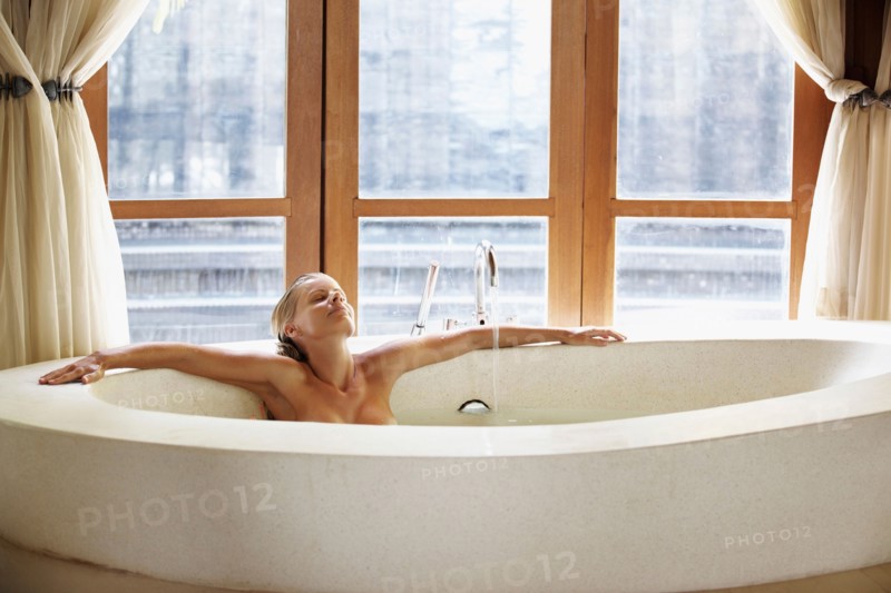 Woman enjoying bath spa