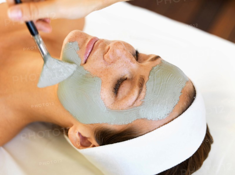 Woman receiving face spa therapy