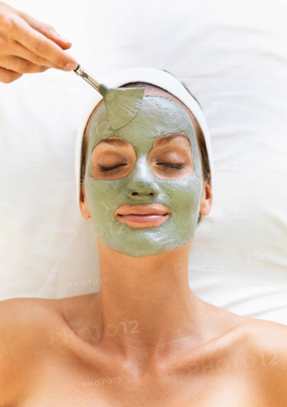 Woman receiving face spa therapy